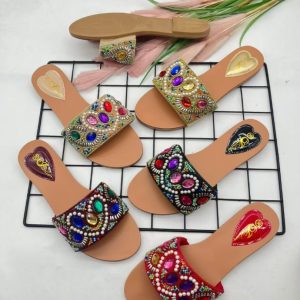 Colorful gemstone slip-ons with intricate beadwork